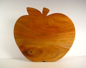 Apple shaped canarywood cutting board