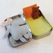 silver grey Wee Mouse in Altoids Tin House with yellow and orange bedding - in stock and ready to ship