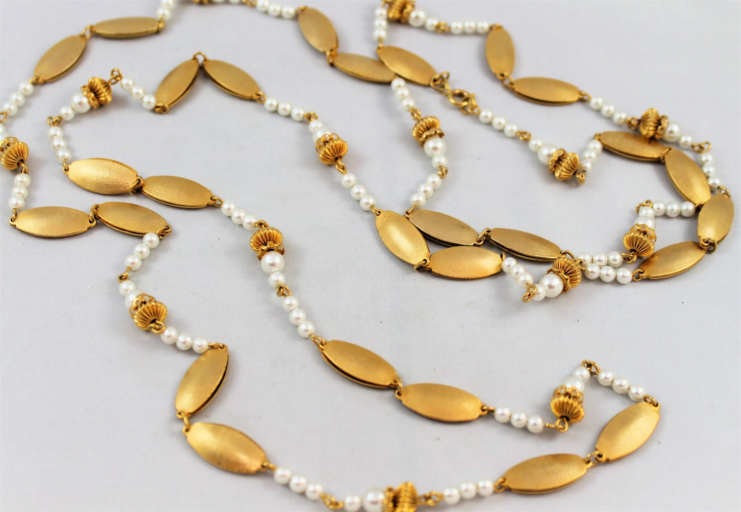 Flapper style necklace 54" gold oval links fluted blossom bead caps ivory pearls vintage OOAK high fashion retro
