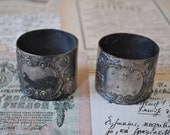 Set of 2 Antique silver plated napkin rings.
