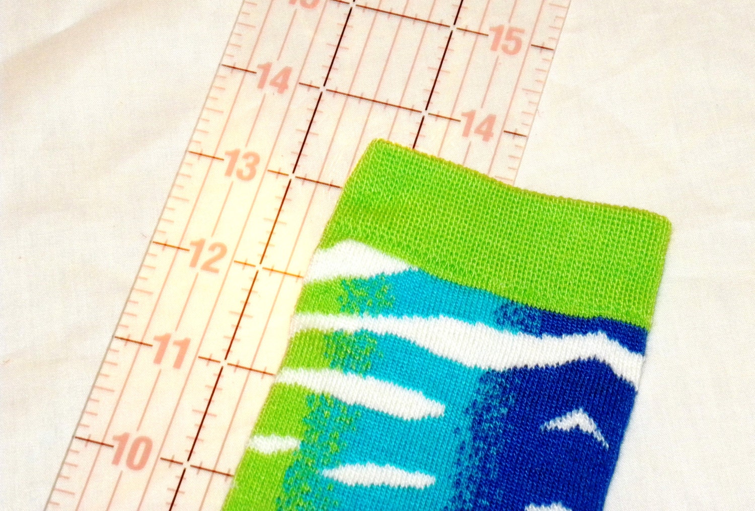 Baby Leg Warmers: Zebra Stripes of Turquoise, Lime Green, Blue, and White with Green Ruffle Trim