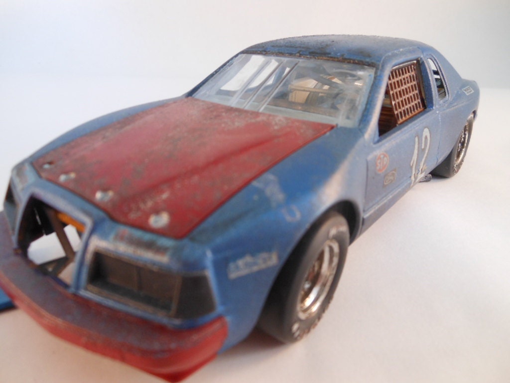 1980s Abandoned thunderbird 1/24 scale model race car in blue