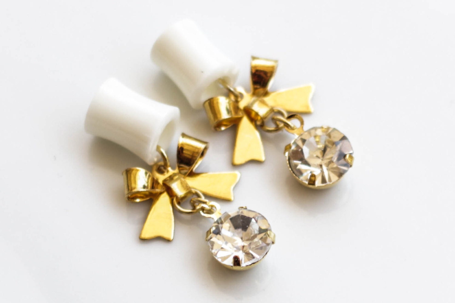 4g-5/8" GOld Bow and Rhinestone Charm on Organic Bone Dangle Plugs Tunnels