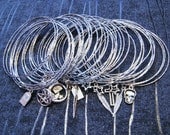 Set of 40 silver charm Goddess bangles