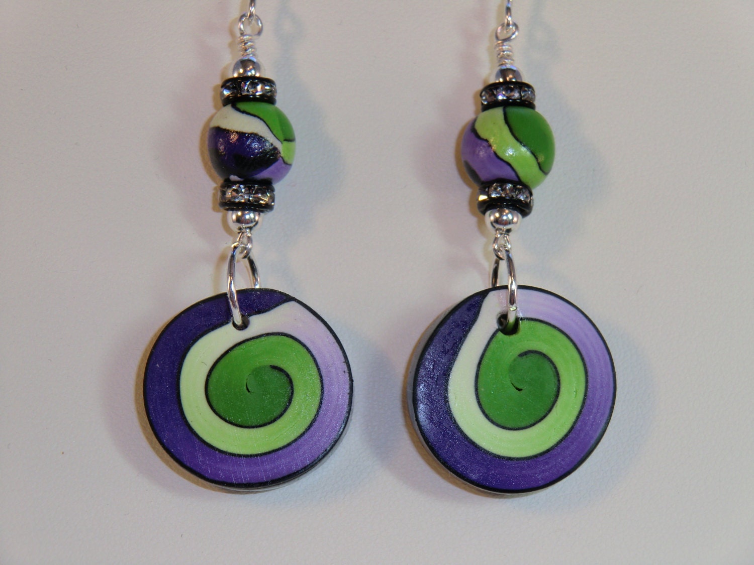 Green, purple, black and white spiral polymer clay dangle earrings, lavender and lime green swirl polymer and rhinestone earrings