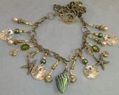 Conch shell glass pendant necklace and earring set, gold, crystal and pearl sand dollar and shell necklace
