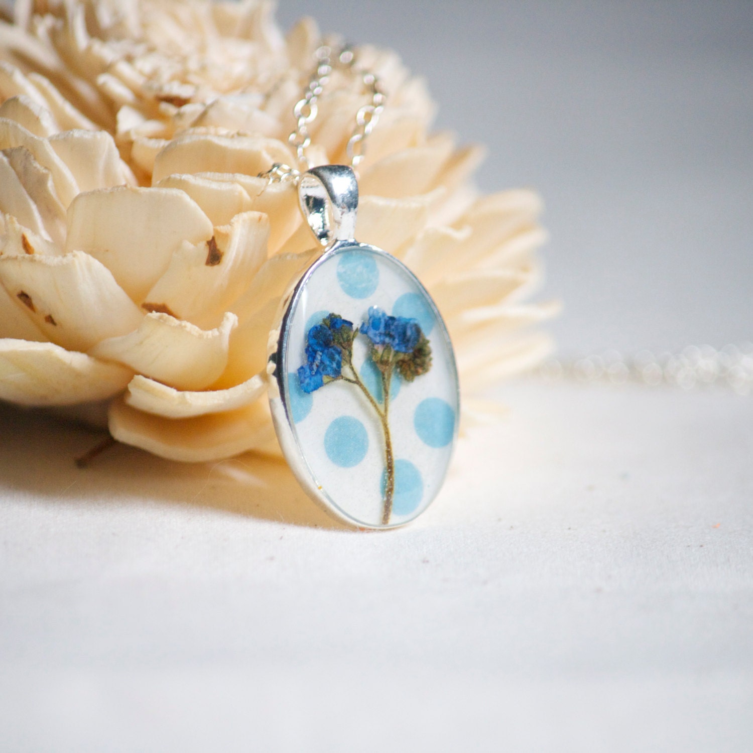 pressed flower necklace real floral blue polkadot jewelry pendant handmade botanical easter egg pastel