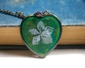 dried flower real pressed flower botanical necklace. heart verdigris patina pendent. blue hydrangea.