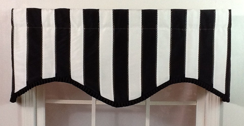Black and white striped shaped valance with black pleated French pleated ribbon trim