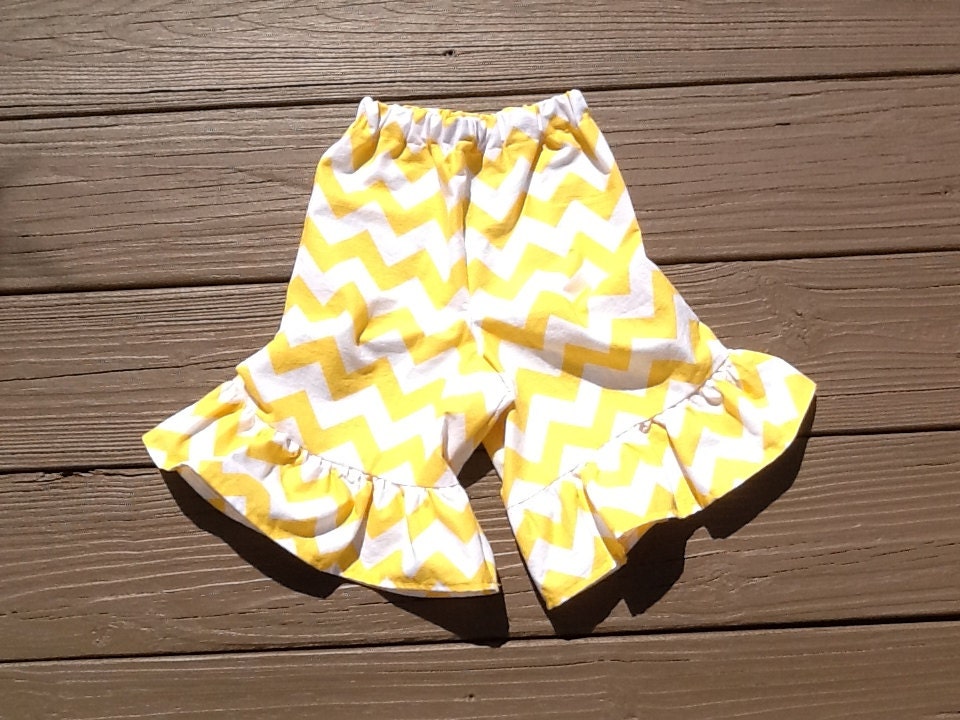 Girls ruffle knee shorts, capris, or pants. yellow white or any color chevron. Custom boutique children's clothing by EverythingSorella.