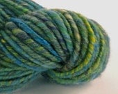 Riverside - Hand spun art yarn. Core spun merino, corriedale and silk. Blues, yellow and greens