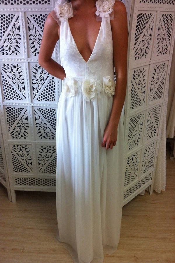Stunning low back wedding dress with sheer straps, silk chiffon, flower detail