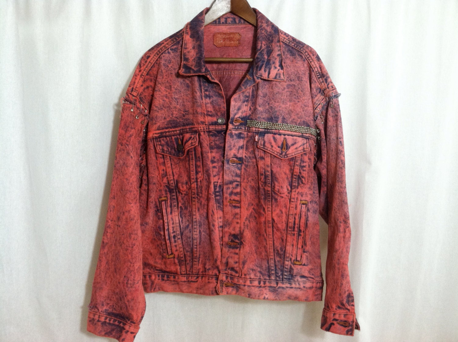 Custom Oversized Denim Jacket With Safety Pinned Sleeves.