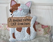 A Spoiled rotten Cat Lives Here Wall Hanging