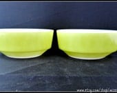 Pair of vintage Anchor Hocking Fire King small milk glass bowls with avocado colored 'outsides'