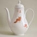 Vintage teapot with fox, toadstool and aztec shape