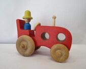 Red toy wooden tractor