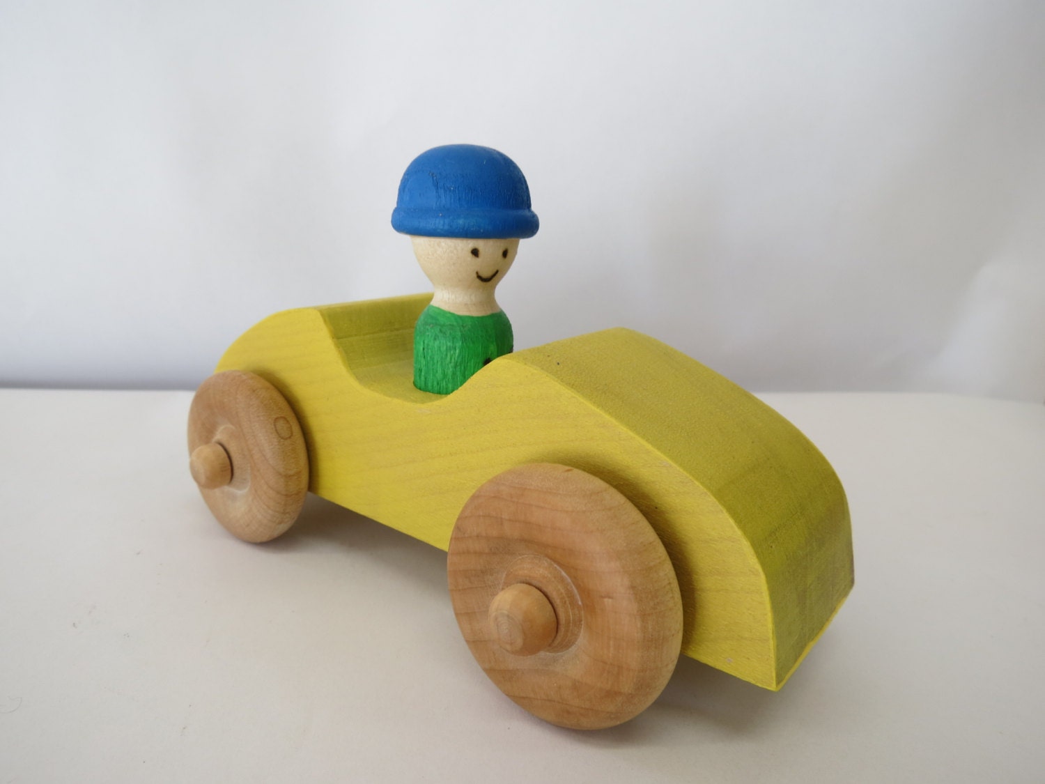 Yellow toy racing car