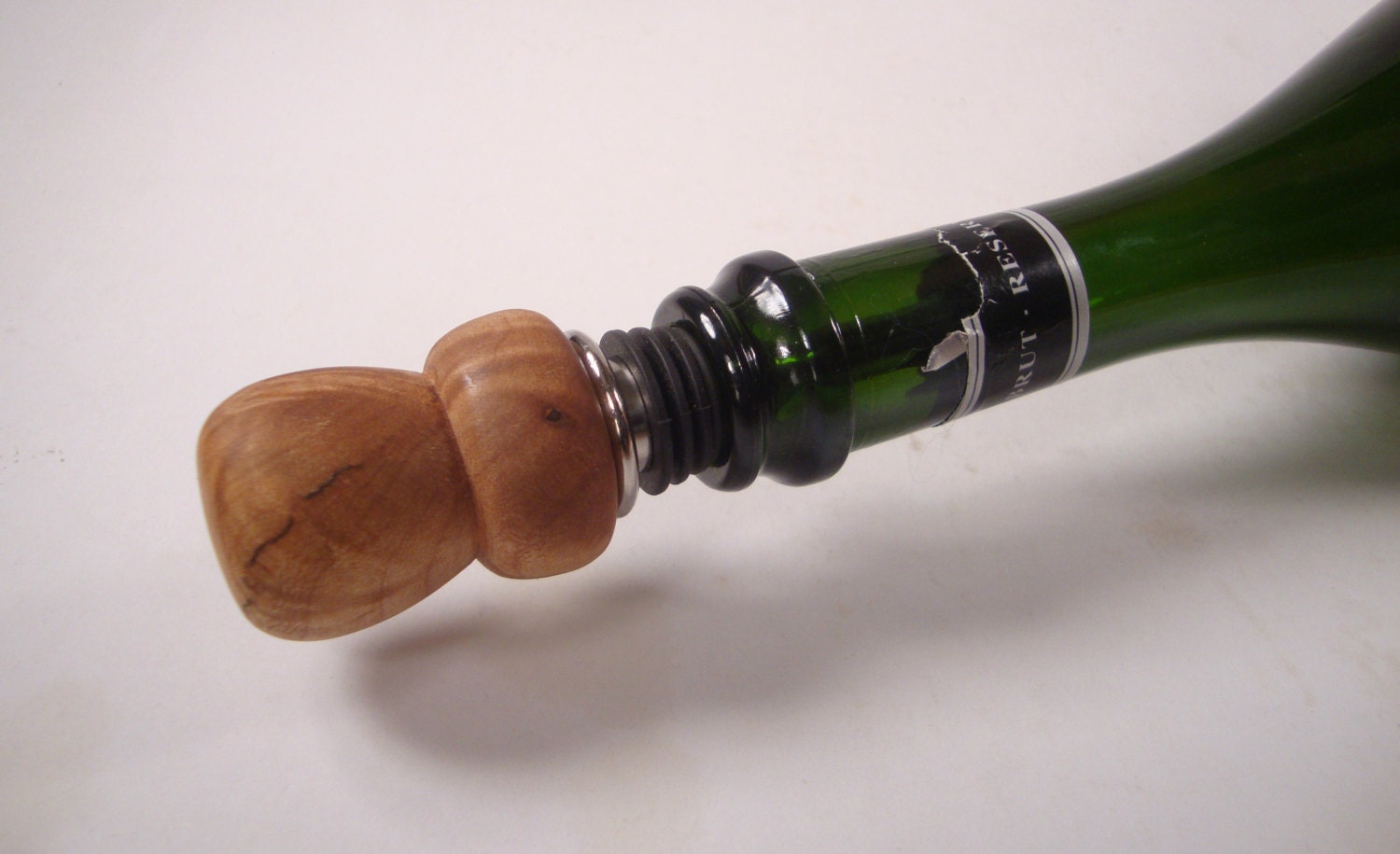 Maple burl bottle stopper, highly figured grain