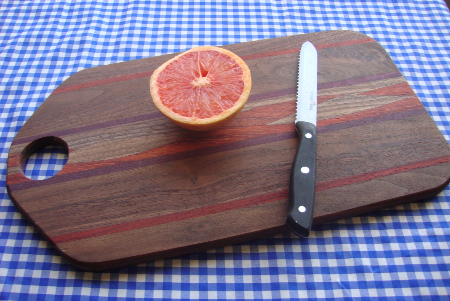 AWESOME 16 inch Black Walnut cutting board or serving board, with some Purple Heart and Padauk (orange wood)