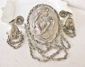 1960s cameo brooch earrings set. silver chain clipons. ANTIQUITY REVIVAL.