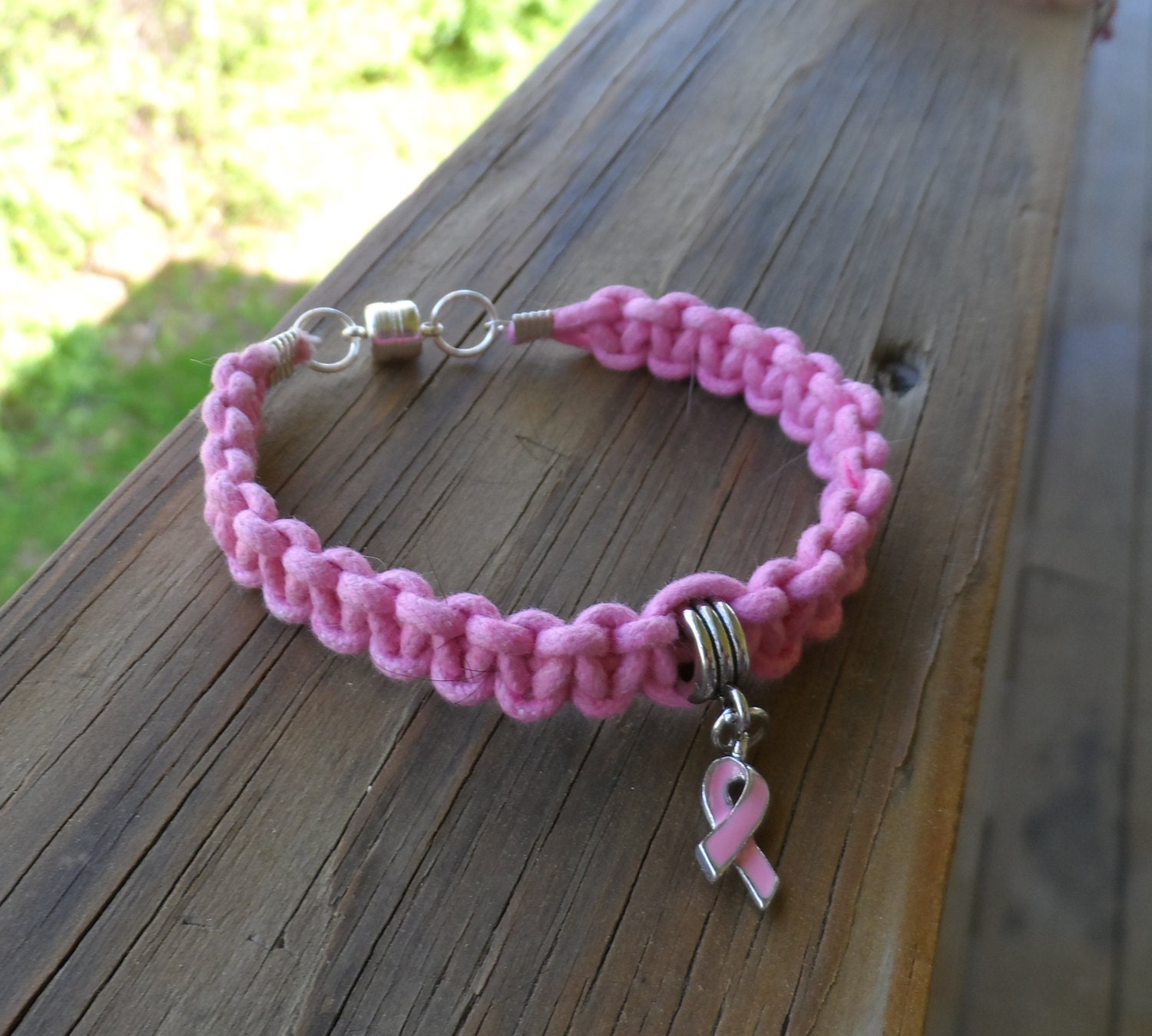 Women's 7" pink cancer awareness bracelet with ribbon charm and magnetic clasp