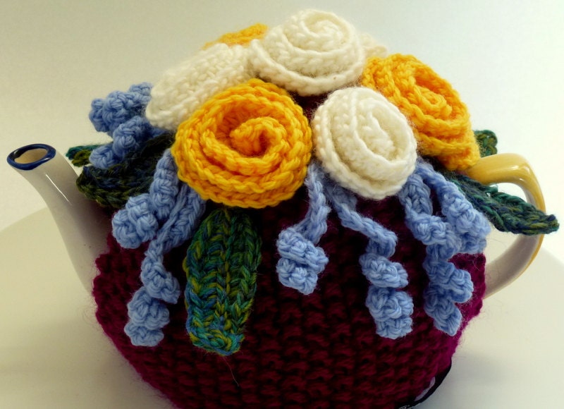 Yellow & white rosette teacozy. Fits 4 to6 cup teapot.