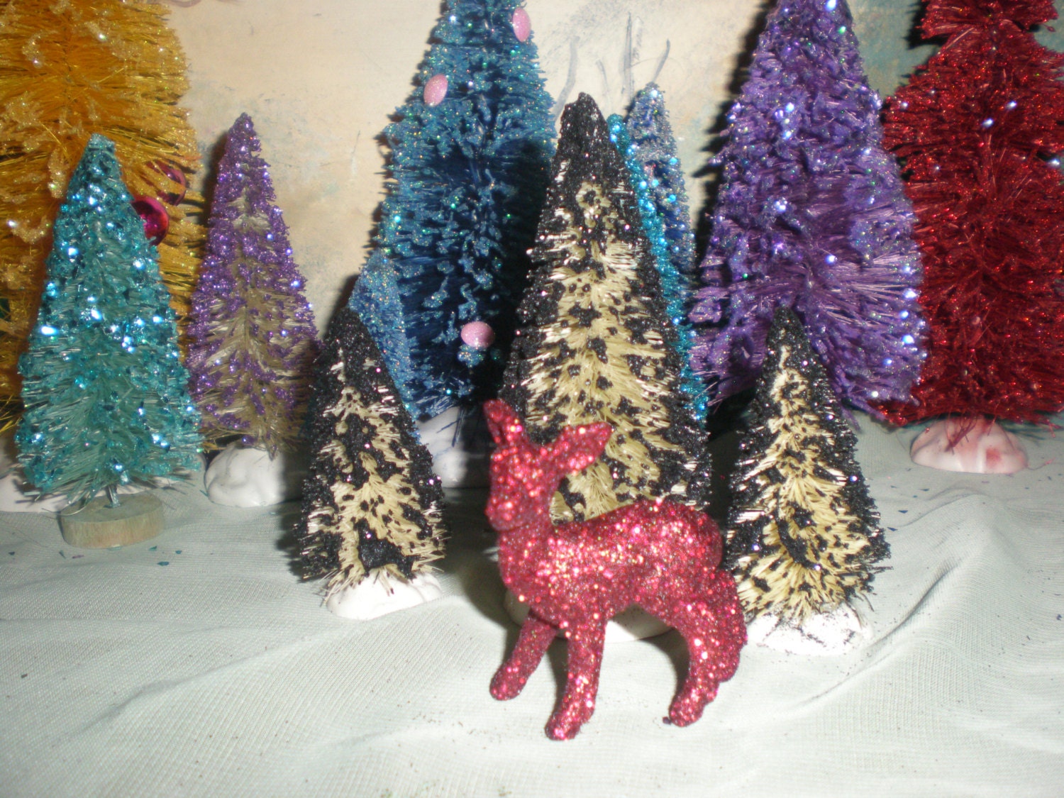 Scene Set: Hand dyed white bottle brush trees frosted in Black glitter (3in, 3in, 4in) and Red glittered doe (2in)