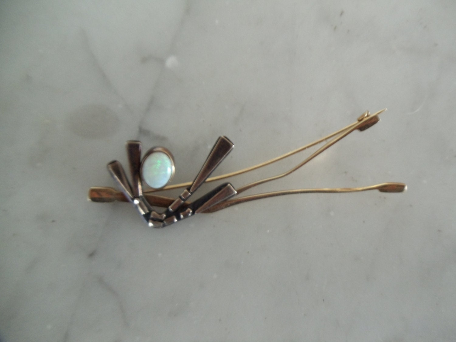 Fire opal pin in 14K gold