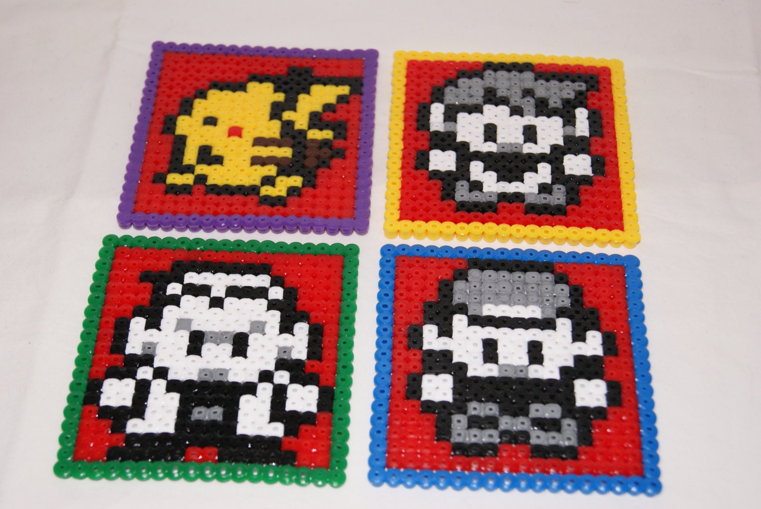 4 x 8 bit Pokemon themed Coasters hama perler beads sprites nintendo Ash Gary Pikachu Prof Oak