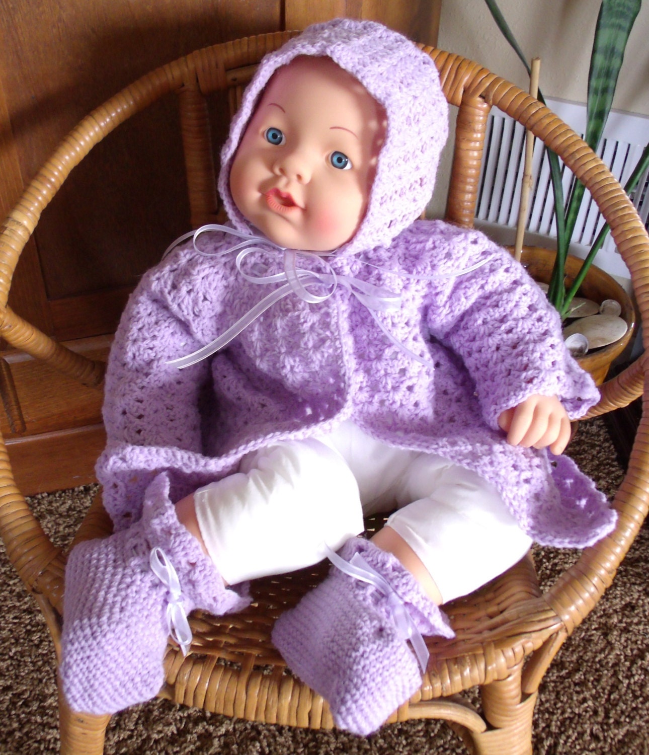 Layette with matching bonnet and booties