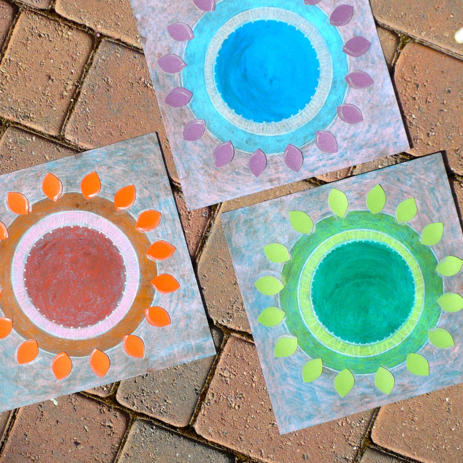 Three mod drawings of the sun, made with Green Purple Orange and Pink pastels, Original Mixed Media Art 12x12