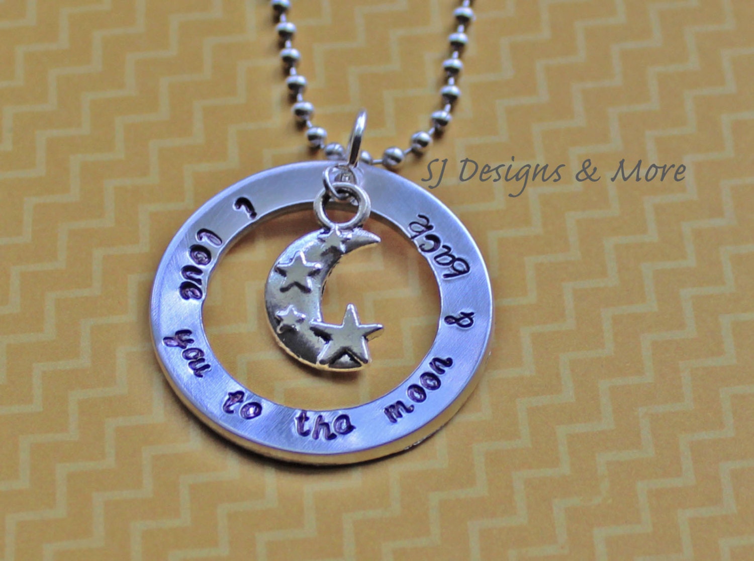 Hand Stamped 'i love you to the moon & back' pendant with moon charm