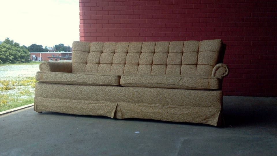 60's era madmen style tufted sofa or couch