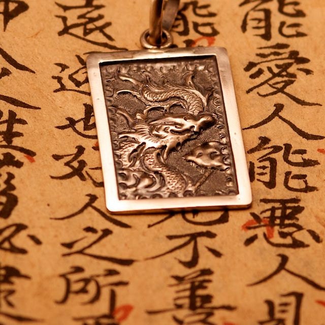 chasing the dragon chain necklace and pendant recycled sterling silver