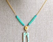 Elizabeth. aqua blue enamel pendant,beaded floral necklace.Tiedupmemories