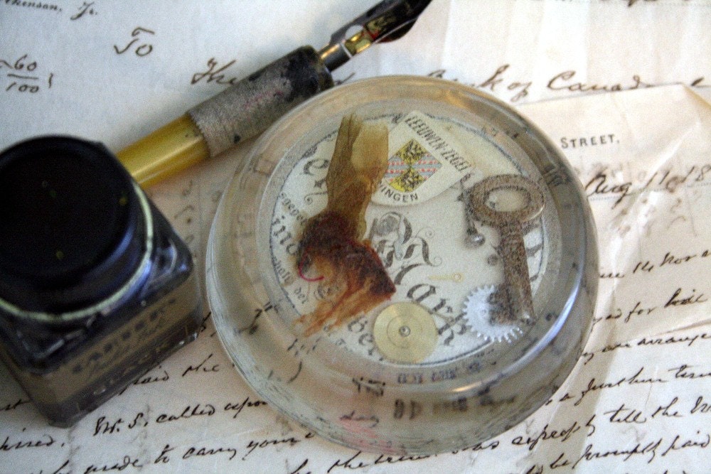 Vintage Glass Paperweight Steampunk Gears, Key, Scrap of Fabric