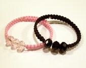 Set of two triple wish beaded adjustable memory wire bracelets in light pink and midnight black