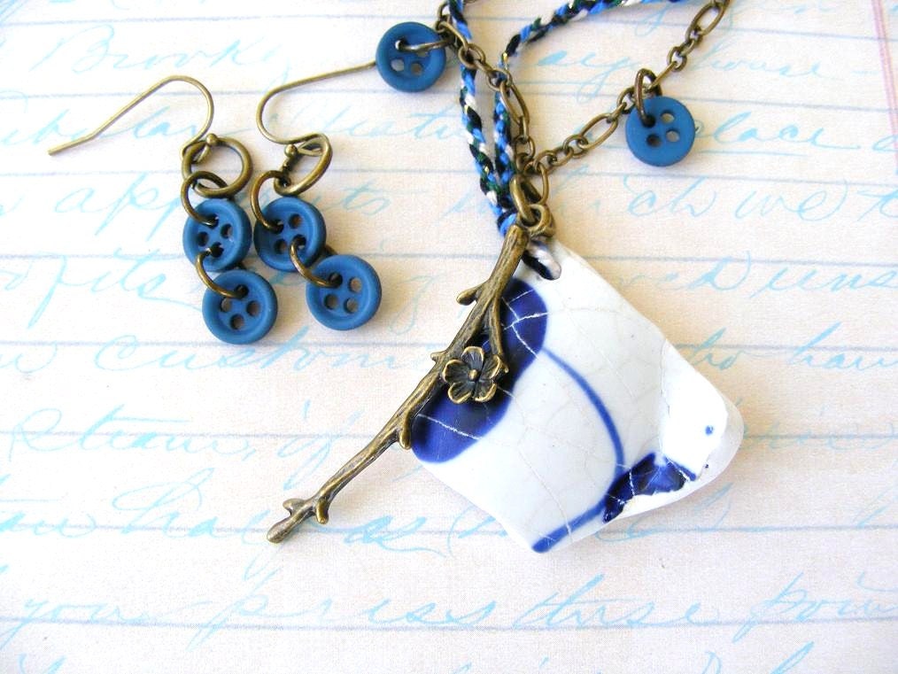Navy Blue and Creamy White Broken Pottery Shard Pendant with Antique Brass Rose Branch Charm on Woven Cotton Cord and Tiny Navy Buttons