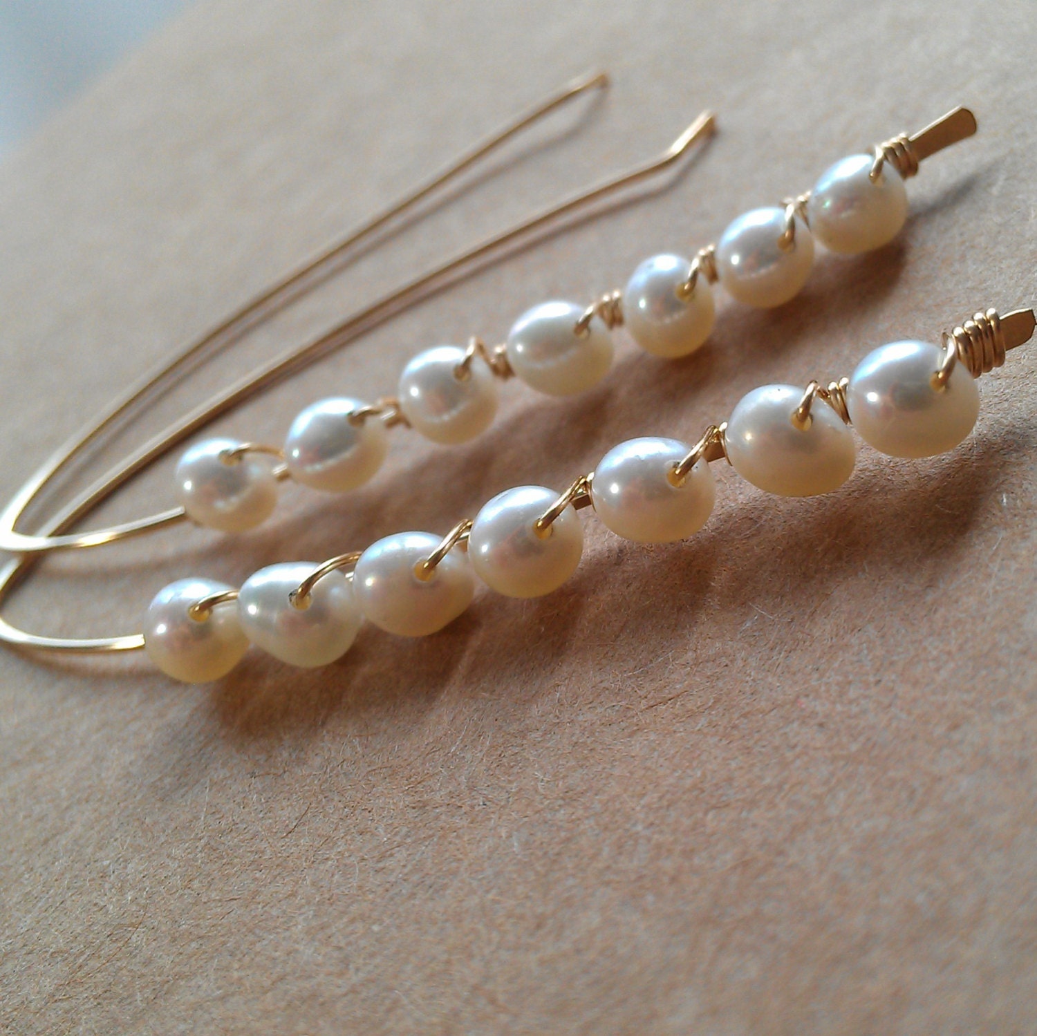 enchanting pearl wrapped gold earrings // june birthstone // unique stick earrings