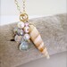 Summer Shell beachy necklace with pearls on gold chain