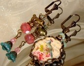 Bird in a nest asymmetrical earrings