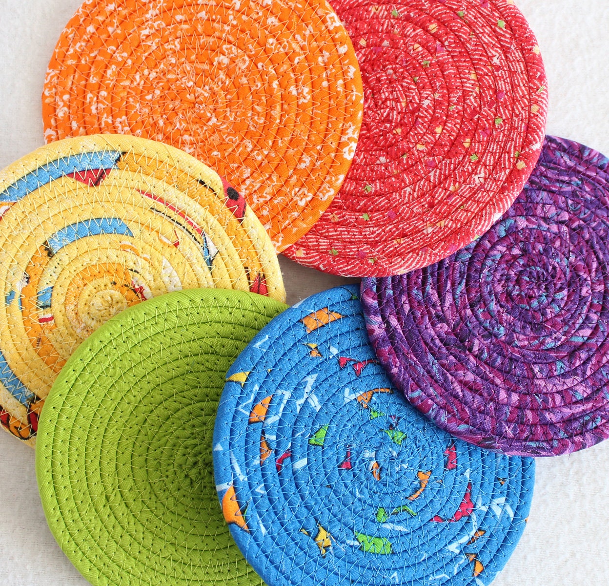 Rainbow Coiled Fabric Coasters / set of 6 / by PrairieThreads