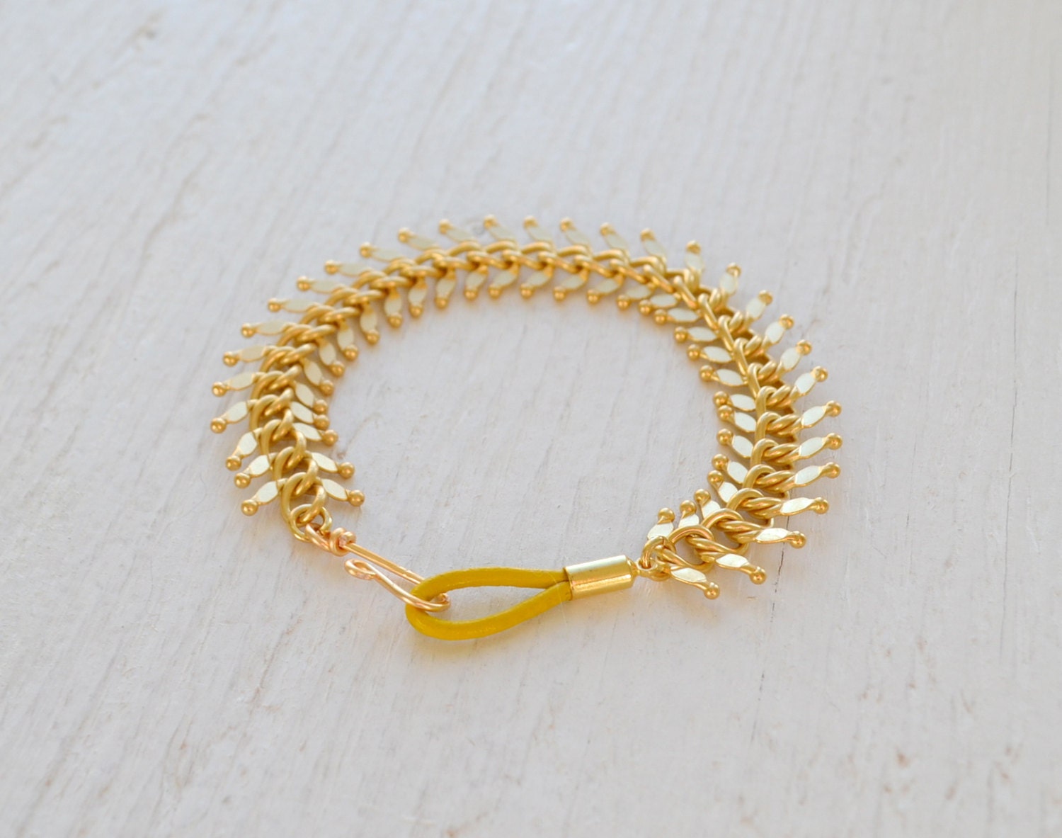 Fishbone Matte Gold Bracelet with Yellow Leather Clasp