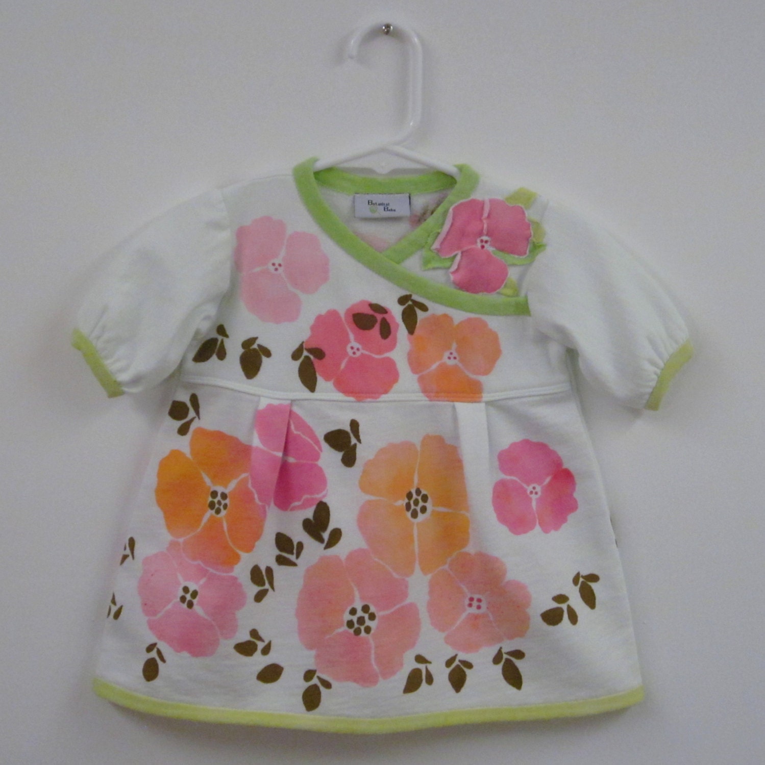 6 to 9 mo. Baby Girl Dress. Palest blue organic light fleece, short sleeve cross over front. Pretty Poppies. One Appliqued