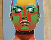 chameleon women painting on corrugated card,stencils & spraypaints,urban,multicolored,graffiti,woman,face,portrait,eyes,lips,skin deep