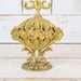 Vintage gold ornate metal filigree perfume bottle