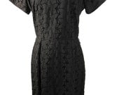 1950s Vintage Eyelet Lace Hourglass Black Cocktail Dress by NINA ORIGINALS. Waist 29