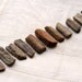 13 ancient fossil bone sticks (1" - 1.25")