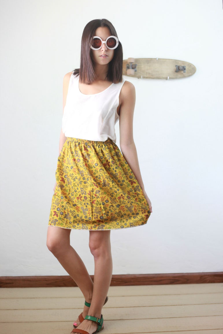 mustard yellow floral mini skirt
